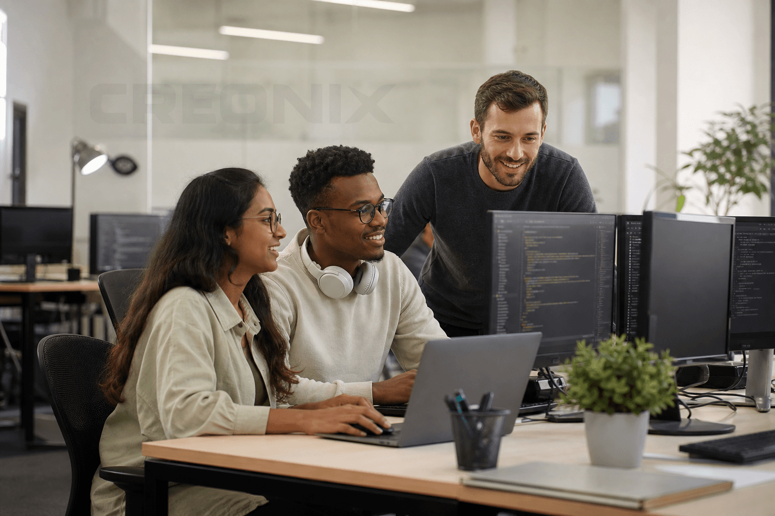 Creonix team collaborating